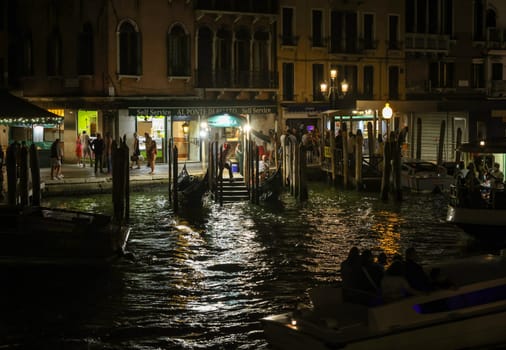 Venice, Italy - September 4, 2022: The Grand Canal near the Rialto Bridge at night