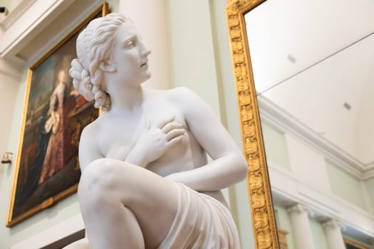 Florence, Italy - 27 July 2023: Pitti Palace Museum, Susanna statue by O. Fantacchiotti. Beautiful nude woman in classic figure