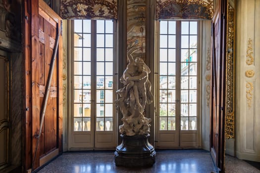 Genova, Italy - 6 August 2023: Royal Palace museum interior. Luxury marble, gallery with windows and mirrors.