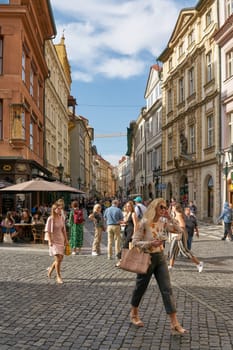 Tourists and residents in a popular shopping street in the old town of Prague in the Czech Republic