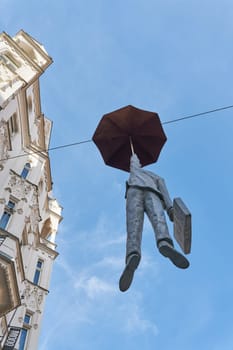 the art installation Slight Uncertainty, Homme Medium by Czech artist Michal Trpak in the old town of Prague