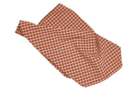 Closeup of a brown and white checkered napkin or tablecloth texture isolated on white background. Clipping path. Kitchen accessories. Top view.