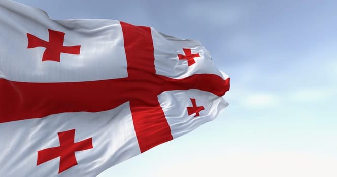 National flag of Georgia waving in the wind on a clear day. White with a red cross, four smaller crosses in each quadrant. 3d illustration render. Fluttering fabric