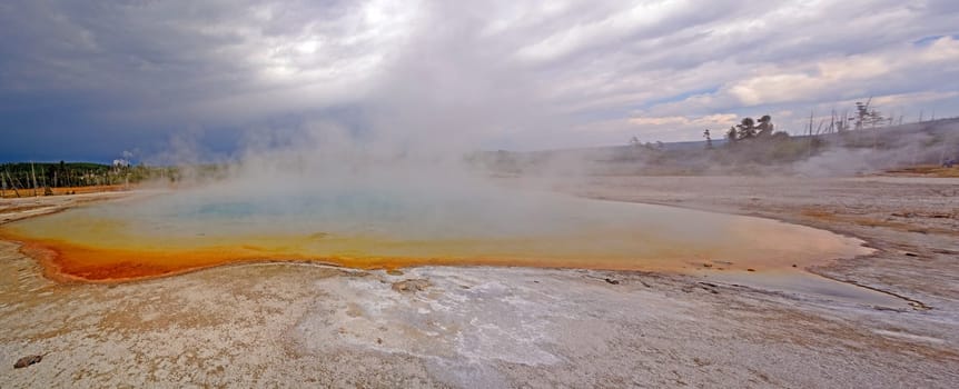 Storm Approaching Over a Hot Spring at the Sapphire Pool in Yellowstone National Park
