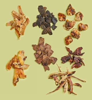Top view of assortment of natural dried treats for rewarding and training dogs