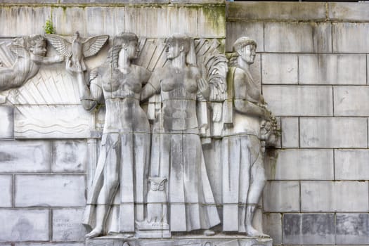 Brussels, Belgium - May 18, 2023: Mount of the Arts (Mont des Arts), relief on facade of Dynasty Palace