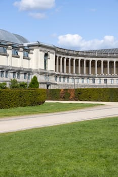 Brussels, Belgium - May 16, 2023: Cinquantenaire Arcade in Parc du Cinquantenaire (Jubelpark). Centrepiece is a monumental triple triumphal arch known as the Cinquantenaire Arch