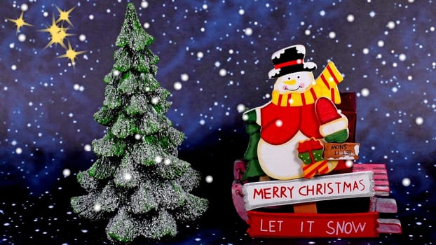 Santa Claus with text Merry Christmas and snowy fir tree on a night sky