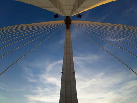 Puente Real at sunset, Badajoz, Spain. Low angle of the pillars and steel tensioners