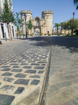 Rails of the former 19th century tram. Puerta Palmas Gate, Badajoz, Spain