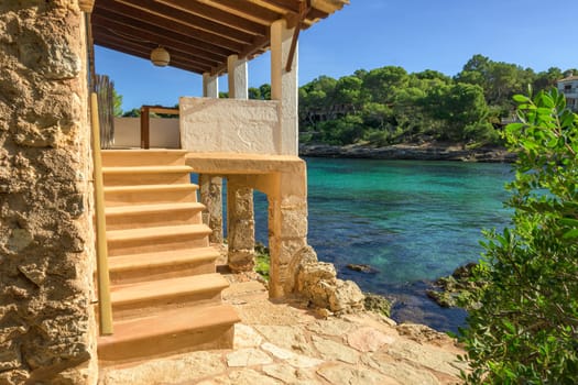 small jetty on the coast next to the beach of mallorca,balearic islands,spain.