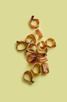 Top view of dehydrated organic beef throat cut on rings, reward for dogs