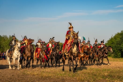 Gniew, Poland, Aug 2020 Castellan on a horse leading his Hussars, Polish heavy cavalry, historical reenactment of Battle of Gniew, Polish Swedish war