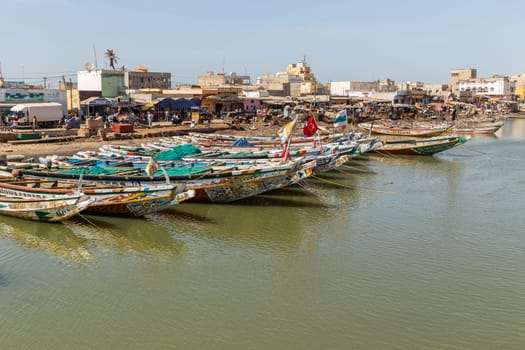 Saint Louis, Senegal: 28 January 2019 - Fishing boats resting on the riverbank of the river Senegal
