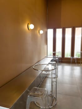 Empty tables in a closed modern coffee shop, stock photo