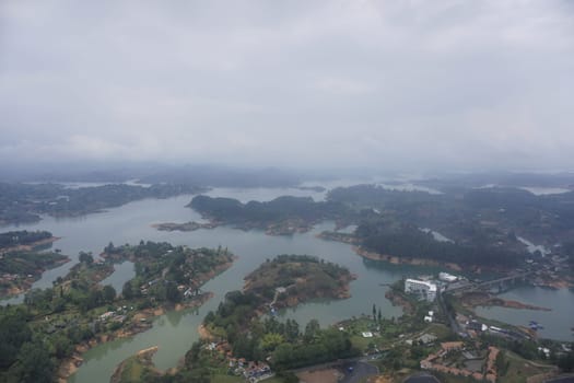 View from the rock of Guatape, El Penon de Guatape on the surrounding lake landscape close to Medellin, Colombia 2020