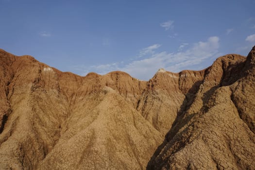 Red and yellow dried soil in the Tatacoa Desert, Desierto de la Tatacoa, eroded rock formations, Colombia 2020