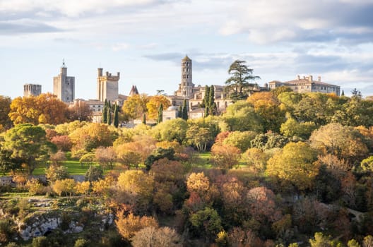 Uzès city of Art and History, general view in autumn. His 11th Century Tour Fenestrelle or Window Tower of the Cathedral of Saint Theodorit. Photography taken in Gard, France