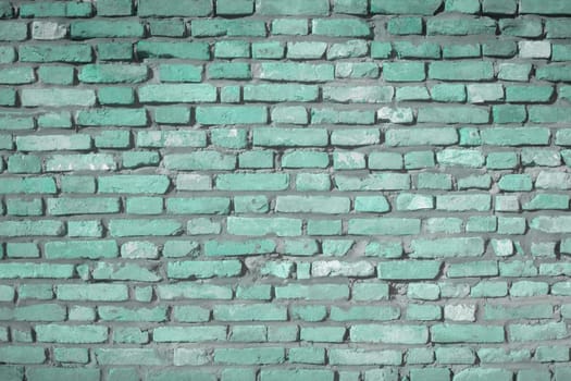 Green or turquoise brick wall as texture background.