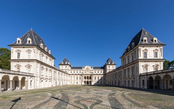 Turin, Italy - February 2023: castle exterior. Historical landmark with blue sky and daylight
