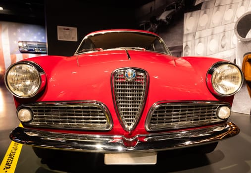Turin, Italy - 11 november 2023: Car Museum. Alfa Romeo Giulietta Sprint, 1954. Red spider, Italian luxury classic design.
