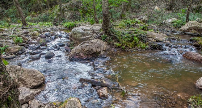 Ruecas river flowing through Villuercas geopark landscapes, Caceres, Extremadura, Spain