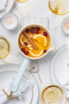 Delicious white mulled wine with honey, cranberries and spices