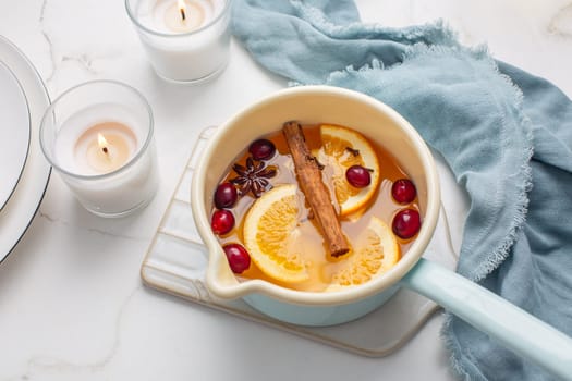 Delicious white mulled wine with honey, cranberries and spices