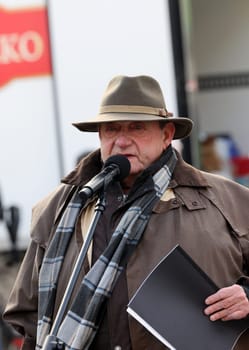 Cracow, Poland - Dec 17, 2023: Jan Kosciuszko a philanthropist, restaurateur and organizer Christmas Eve for poor and homeless on the Main Square in Cracow. Poland