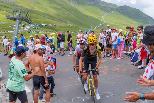 Col du Tourmalet, France - July 06 2023: Tiesj Benoot climbig the road to Col du Tourmalet in Pyerenees mountains during the stage 6 of Le Tour de France 2023.