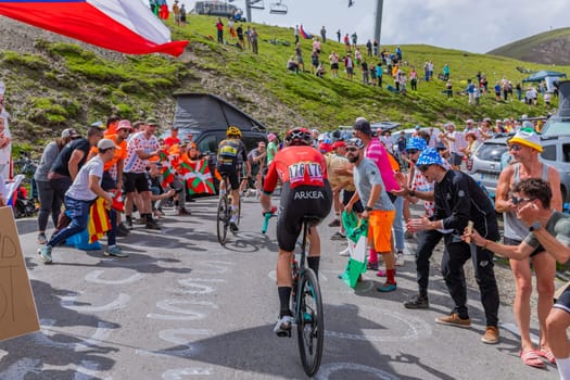Col du Tourmalet, France - July 06 2023: Matis Louvel climbig the road to Col du Tourmalet in Pyerenees mountains during the stage 6 of Le Tour de France 2023.
