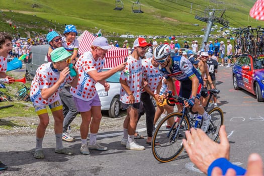 Col du Tourmalet, France - July 06 2023: Julian Alaphilippe climbig the road to Col du Tourmalet in Pyerenees mountains during the stage 6 of Le Tour de France 2023.