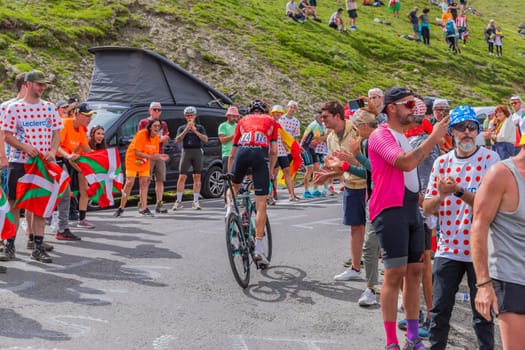 Col du Tourmalet, France - July 06 2023: Anthony Delaplace climbig the road to Col du Tourmalet in Pyerenees mountains during the stage 6 of Le Tour de France 2023.
