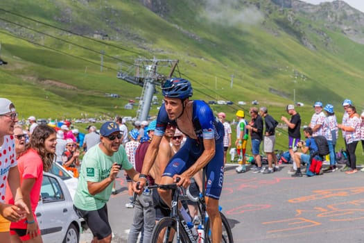 Col du Tourmalet, France - July 06 2023: Kevin Geniets climbig the road to Col du Tourmalet in Pyerenees mountains during the stage 6 of Le Tour de France 2023.