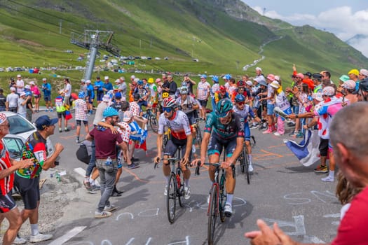 Col du Tourmalet, France - July 06 2023: Riders climbig the road to Col du Tourmalet in Pyerenees mountains during the stage 6 of Le Tour de France 2023.