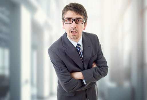 young business man surprised, at the office