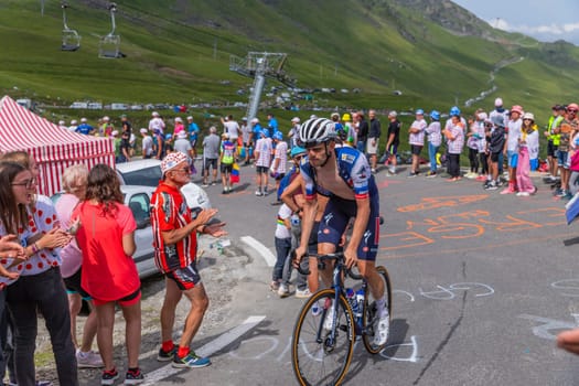 Col du Tourmalet, France - July 06 2023: Kasper Asgreen climbig the road to Col du Tourmalet in Pyerenees mountains during the stage 6 of Le Tour de France 2023.