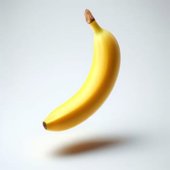 A single, fresh, yellow banana with a smooth texture, isolated on a white background