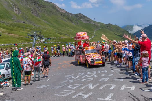 Col du Tourmalet, France - July 06 2023: Caravan car at the top of the Col du Tourmalet in Pyerenees mountains during the stage 6 of Le Tour de France 2023
