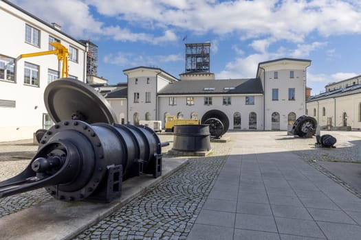 Walbrzych, Poland - October 1, 2021: The Old Mine Science and Art Centre, museum located in the historic Julia Coal Mine. Fragments of old machines used in coal mines
