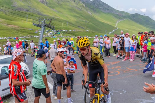 Col du Tourmalet, France - July 06 2023: Tiesj Benoot climbig the road to Col du Tourmalet in Pyerenees mountains during the stage 6 of Le Tour de France 2023.