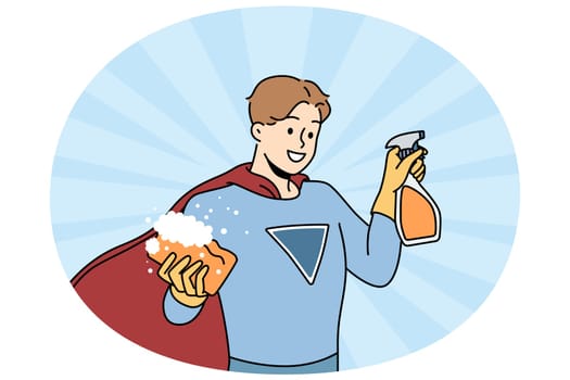 Smiling male housekeeper with washcloth and detergent