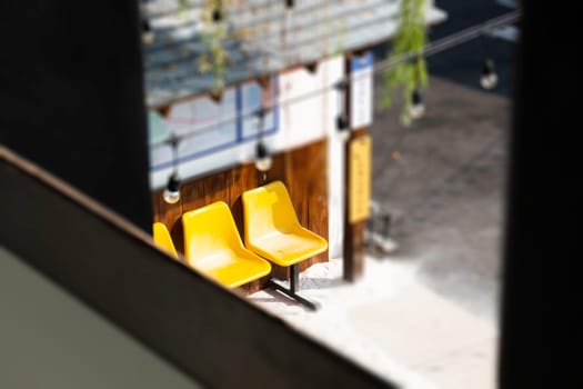Yellow plastic seats on the road, stock photo