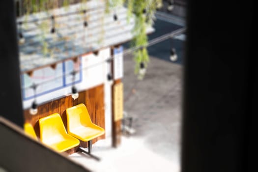 Yellow plastic seats on the road, stock photo