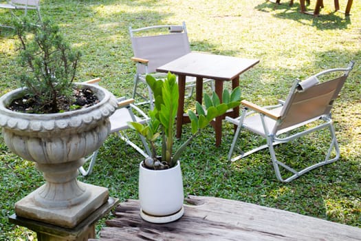 Outdoors seats in coffee shop garden, stock photo