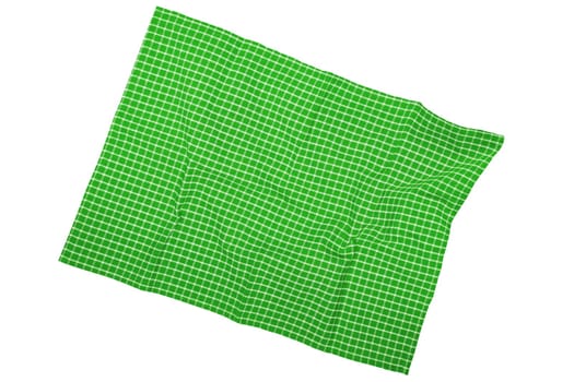 Closeup of a green and white checkered napkin or tablecloth texture isolated on white background. Kitchen accessories. Top view.