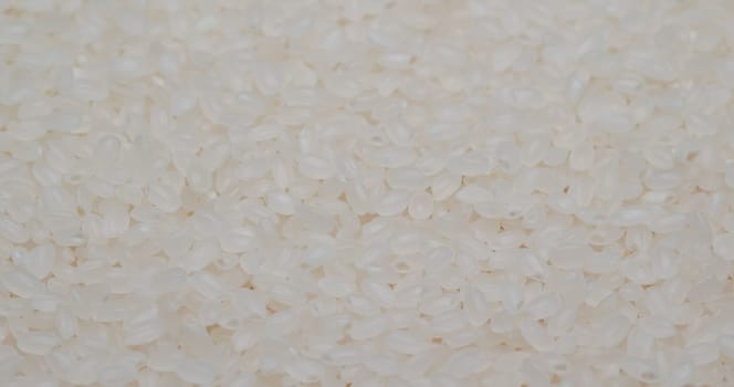 Uncooked white rice in stack