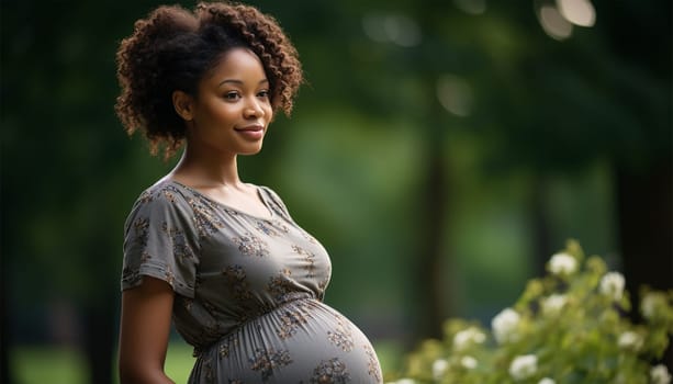 African American pregnant woman. Beautiful pregnant black woman hugging her tummy, enjoying her pregnancy, free space. Side view of African American expecting lady standing next to window at home, touching her big belly beauty shot