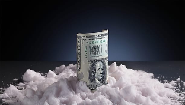 Cocaine with rolled up money. Cocaine drug addiction. Pile of cocaine and one hundred dollars banknote on black background closeup . White powder drugs with dollar. Concept for drug addiction Space for text