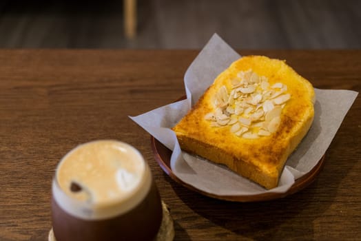 Toast with almond and iced coffee